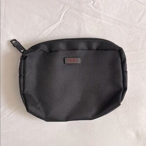 New without tags Tumi nylon small zip pouch